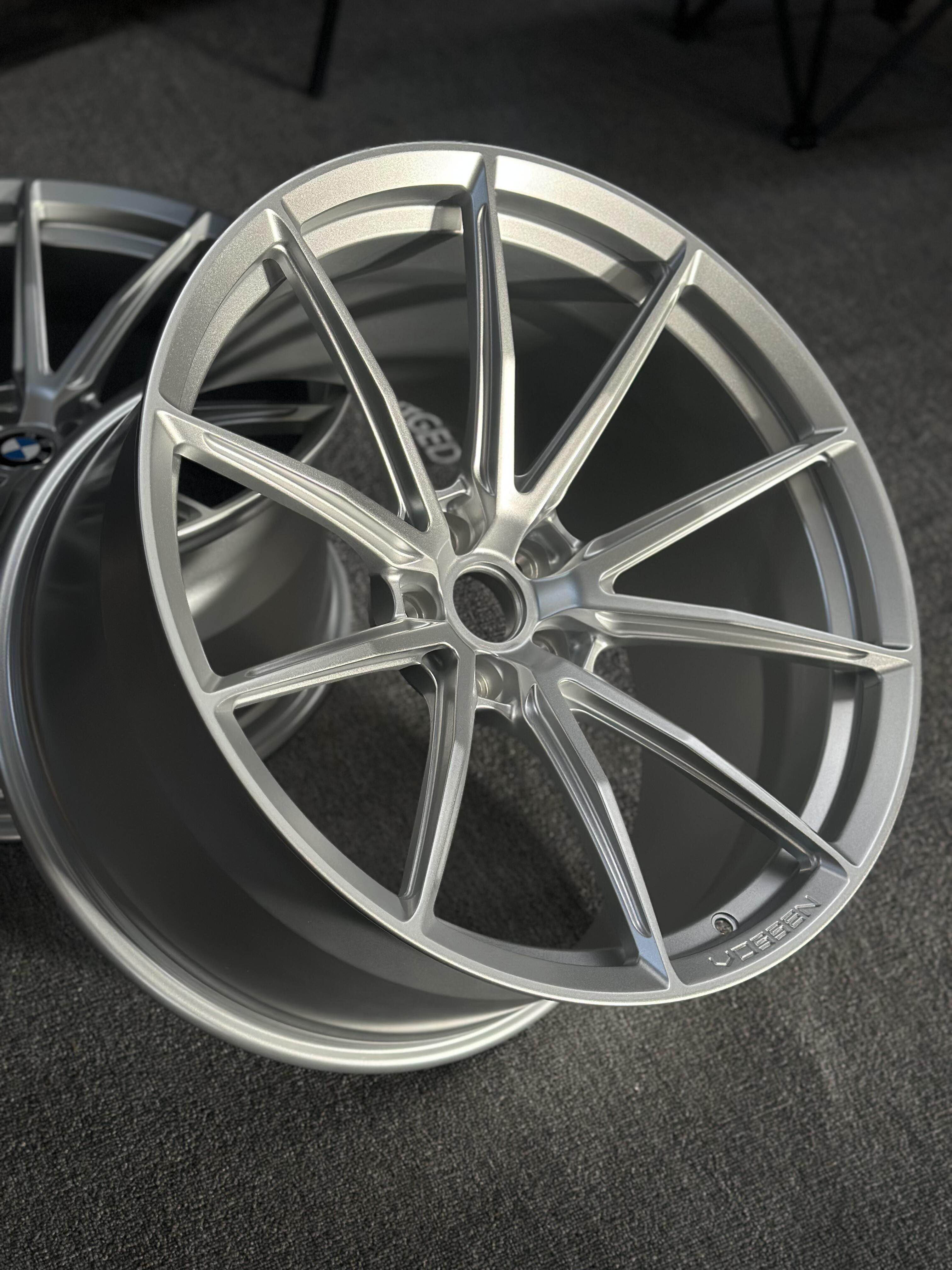 Custom forged WheelWorkCustoms WWC HFX2 performance wheel with intricate spoke design and premium finish.
