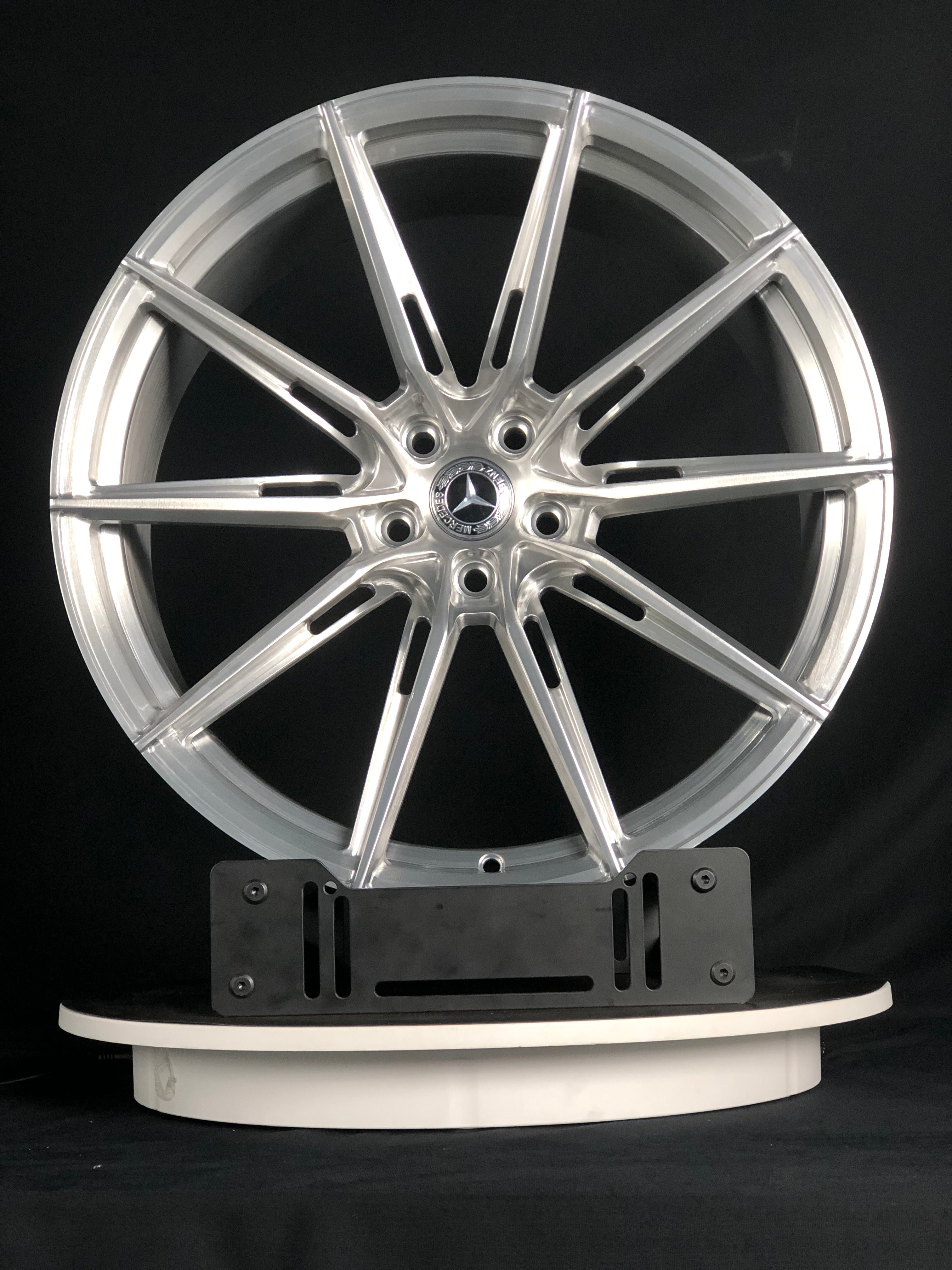 Lightweight WheelWorkCustoms WWC RC3 EVO performance wheel with sleek, modern design and a matte finish, shown on a vehicle.
