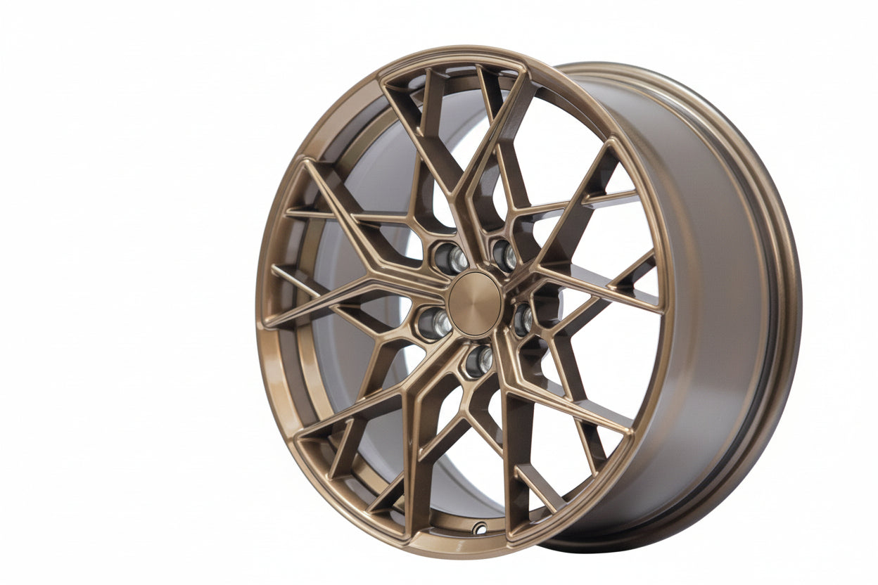 WheelWorkCustoms WWC FF10 multi-spoke flow-form wheel in matte bronze finish, showcasing a sleek design and intricate spoke pattern.