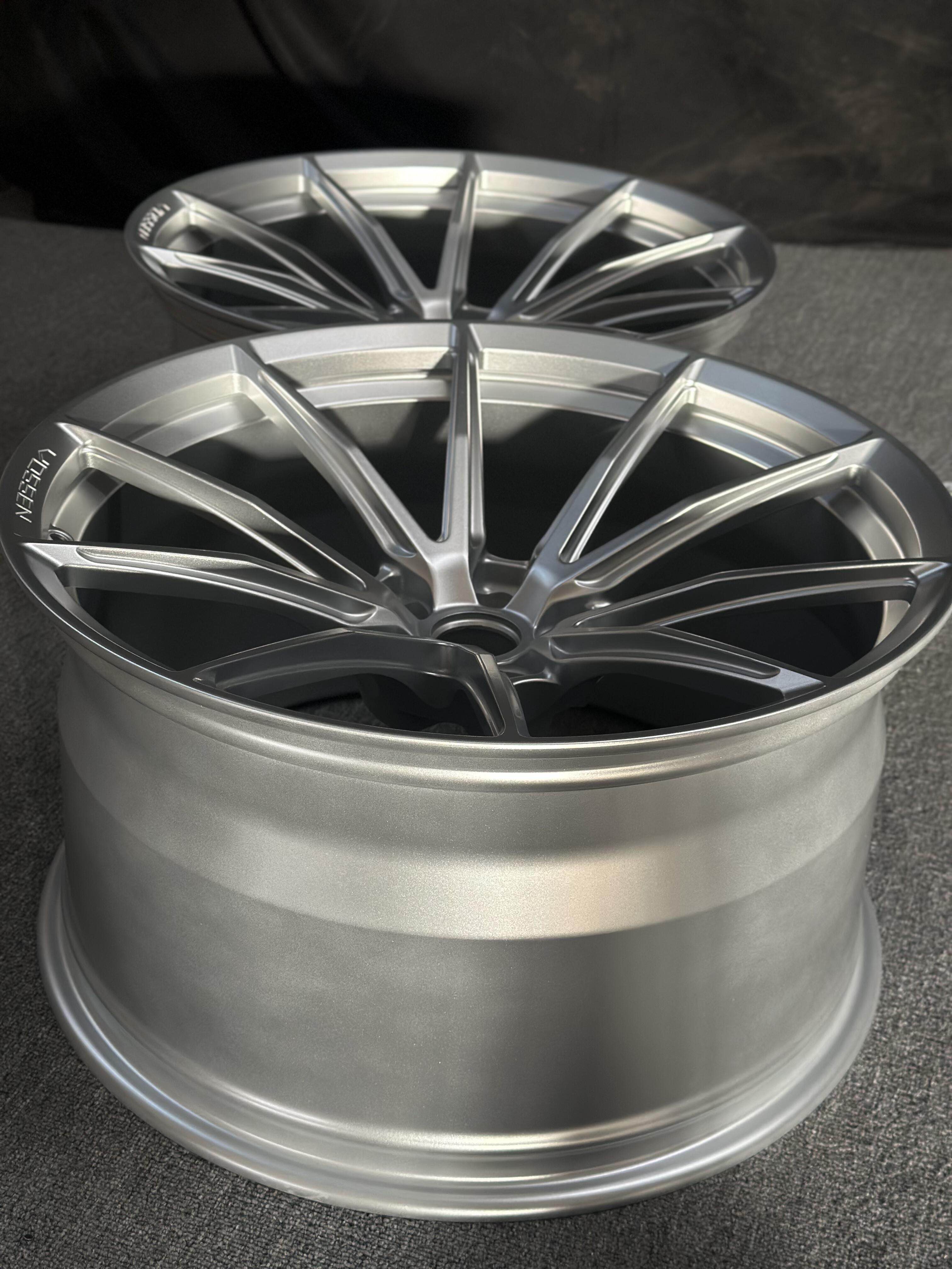 Custom forged WheelWorkCustoms WWC HFX2 performance wheel with intricate spoke design and metallic finish.