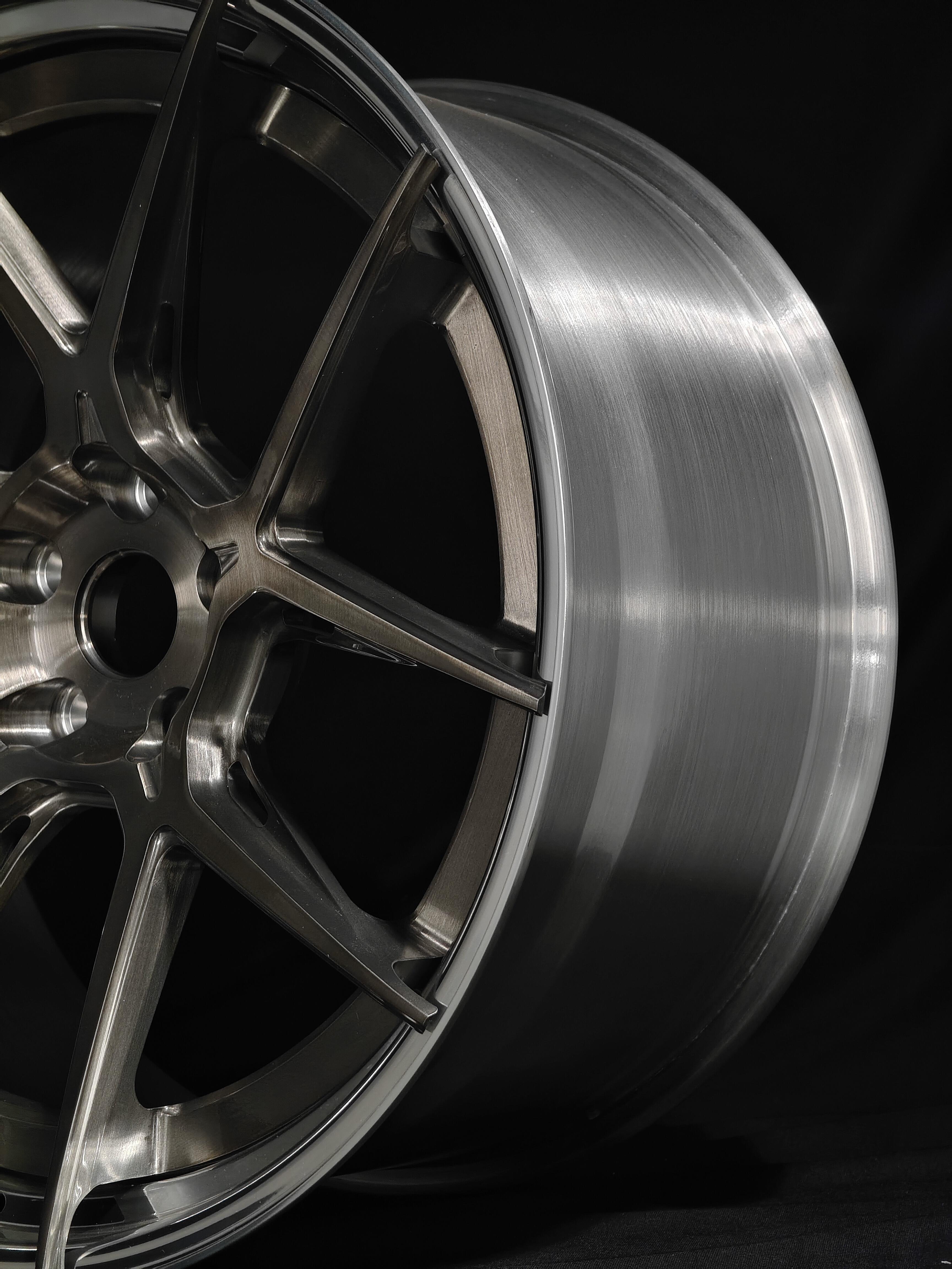 Custom forged WheelWorkCustoms WWC Velocity GT lightweight performance wheel with a sleek design and metallic finish.