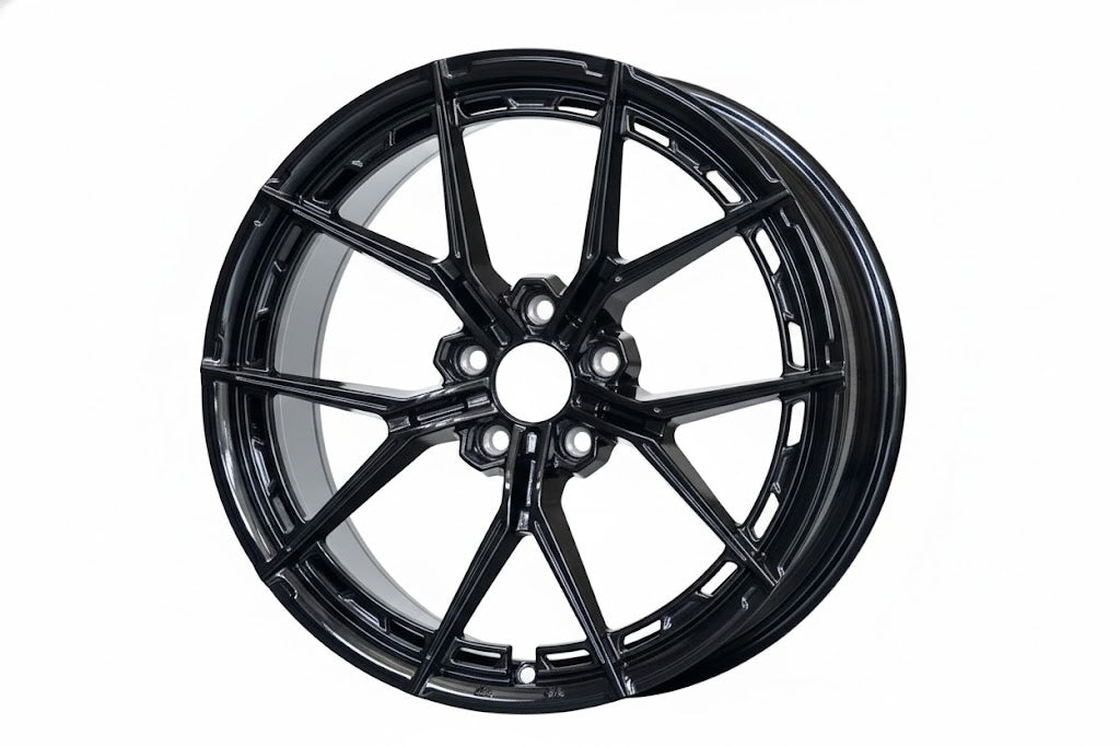 Gloss black WWC VFX Split-Spoke Flow-Form Wheel by WheelWorkCustoms, showcasing sleek multi-spoke design with a glossy finish.