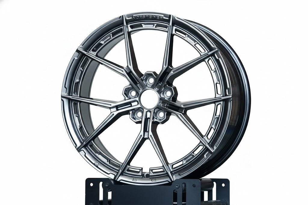 WheelWorkCustoms WWC VFX split-spoke flow-form wheel in gunmetal grey installed on a vehicle, showcasing its sleek design and finish.
